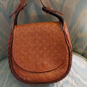 Tooled leather saddlebag purse